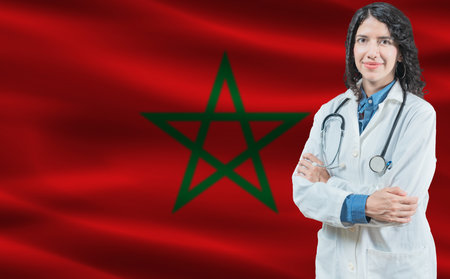Moroccan medicine and healthcare concept. Doctor close up against Morocco flag backgroundの写真素材