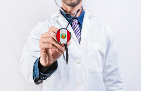Peru healthcare system, doctor holding stethoscope. Peru health and medical insurance conceptの写真素材