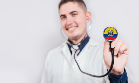 Doctor showing stethoscope with Ecuador flag. Ecuador national healthcare conceptの写真素材