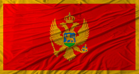 Montenegrin flag waving. Flag of Montenegro with cloth textureの写真素材