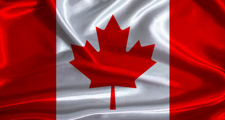 Canada flag with cloth textured background. National flag of Canada with realistic textureの写真素材