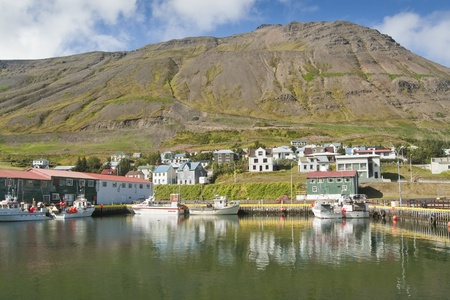 Fishing port in Siglufjordur. It is a small fishing town in a narrow fjord with the same name on the northern coast of Iceland.のeditorial素材
