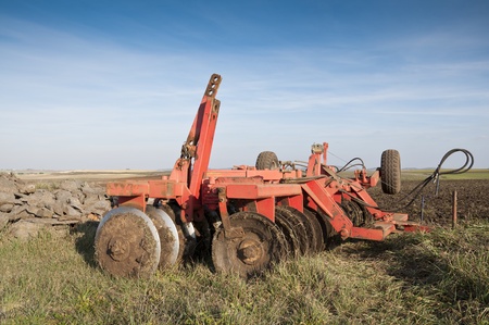 Disk Ripper in the field  Plough is a tool used in farming for initial cultivation of soil