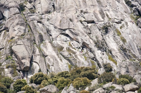 Climbers at Pico de la Miel  Honey Peak , Sierra de la Cabrera, Madrid, Spain
