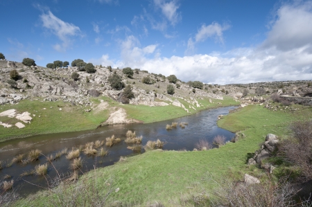 General view of the river Manzanares, where it passes Colmenar Viejo, Madrid Province, Spain  This river has had a great historical importance due to its close relation to the city of Madrid の写真素材
