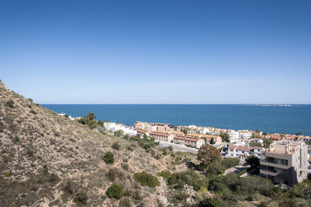 Views of Santa Pola town from Sierra de Santa Pola. It is a coastal town located in the comarca of Baix Vinalopo, in the Valencian Community, Alicante, Spain, by the Mediterranean Seaの写真素材