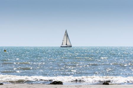 Sailboat sailing in the Mediterranean Sea, in the coast of Santa Pola, Alicante, Spain, on March 21, 2015のeditorial素材