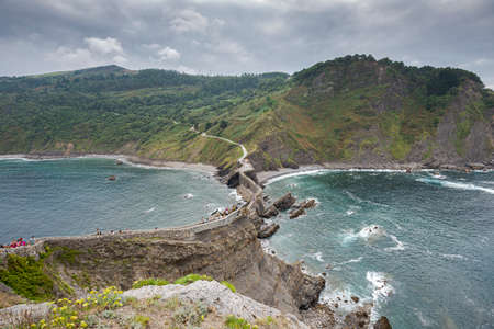 BERMEO, SPAIN - AUGUST 18, 2017: Views of Gaztelugatxe, a famous islet on the coast in the Municipality of Bermeoのeditorial素材