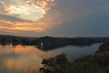 Sail at sunset.の写真素材