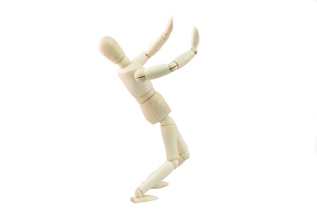 Articulated Wooden Dummy scared to pose isolated on white backgroundの写真素材
