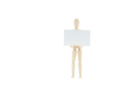 articulated wooden dummy showing a business card, isolated on white background