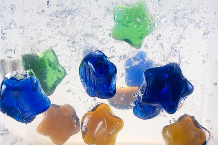 colored objects in the water sinkingの写真素材