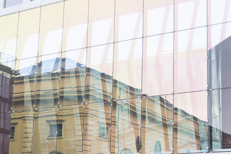 glass wall of office building with reflect