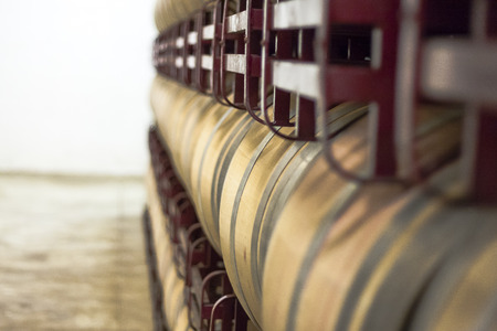 Wine barrels stacked in winery