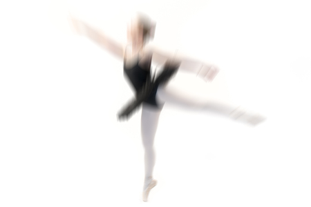 young ballet dancer posing on white backgroundの写真素材