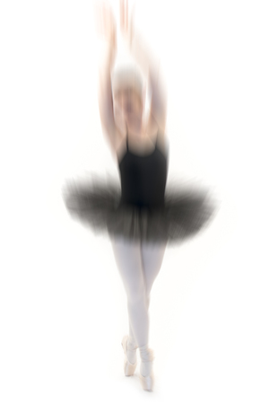 young ballet dancer posing on white backgroundの写真素材