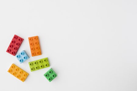 toy bricks of assorted colors on white backgroundの写真素材