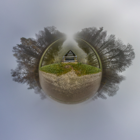 Autumn Little Planet in the forest with fog