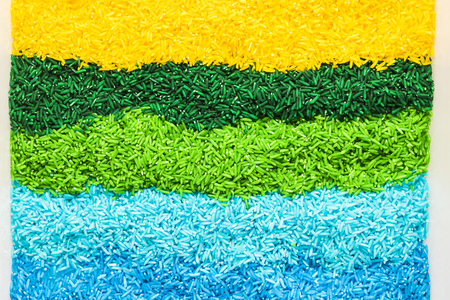 Horizontal lines with colorful rice grainの写真素材