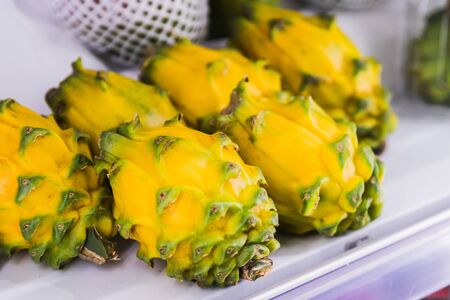 A Pitahaya or dragon fruit, exposed for sale