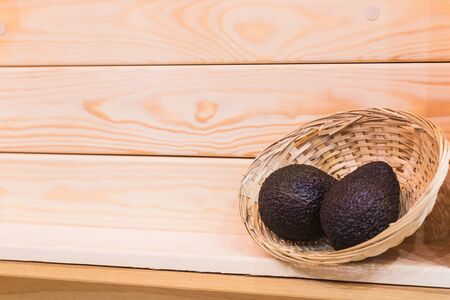 A exhibition of green avocados for sale