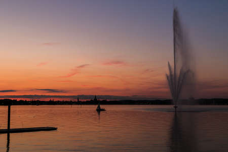 A landscape with sailboat seen from the coastの写真素材