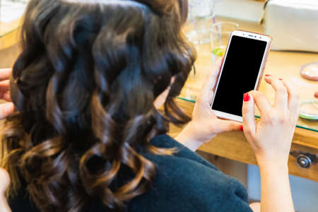 Taking photo with a mobile smart phone with clipping path for the screenの写真素材