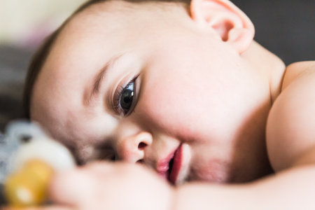 A portrait of adorable baby lyingの写真素材