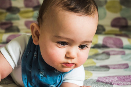 A portrait of adorable baby lyingの写真素材