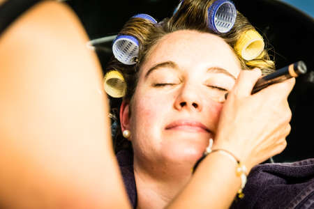 A Woman makeup session on her wedding dayの写真素材