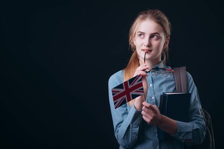 Dreamy Ginger Student Girl With British Flag Looking Aside