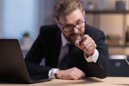 Bearded Man in Suit Making Blaming Index Finger Gestureの写真素材