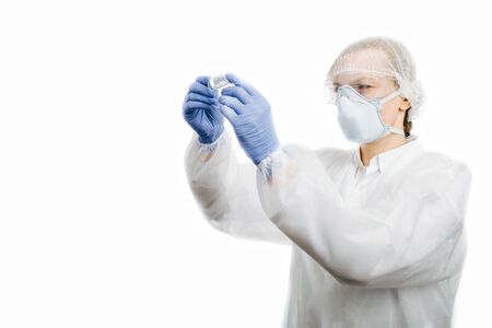 Doctor holding test tube with vaccine from coronavirus