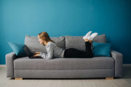 Relaxation at home with laptopの写真素材