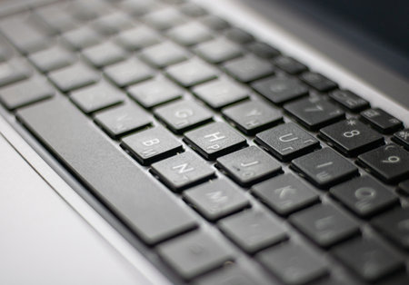 Laptop keyboard black on gray background. Close-up of laptop keyboard.の写真素材