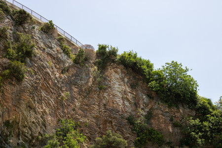 Bridge at the top picturesque rocks. Iron and concrete on the background of plants and stone. Lookout mountain.の写真素材