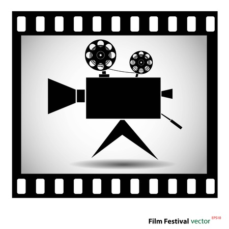 Movie camera at film strip isolated on a white background. stock vector illustrationのイラスト素材