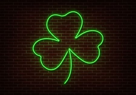 Neon green Shamrock sign vector isolated on brick wall. Light Happy Patric shop decoration element. Neon luck symbol.のイラスト素材