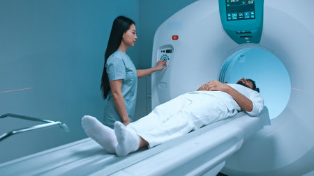 Doctor neurologist performing CT scan for patient at diagnostic clinic. Medical girl nurse putting...