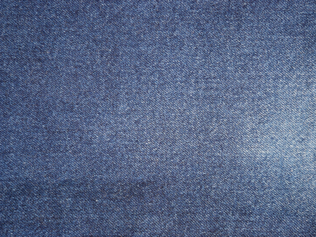 Jeans cloth fabric pattern background. Close up blue jeans textile style for background.の写真素材