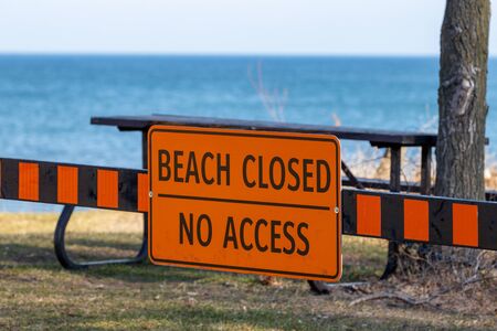 Burlington, Canada, December 23, 2019: Sign indicating Lake Ontario beach at Burlington Waterfront is closedの写真素材