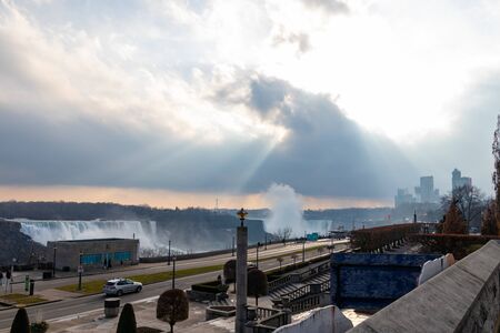 Wide shot of American Falls and Horseshoe Falls on a winter day in Niagara Falls