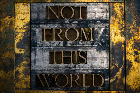 Not From this World text formed with real authentic typeset letters on vintage textured silver...