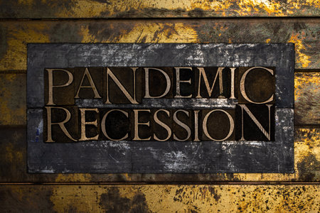 Pandemic Recession text on vintage textured bronze grunge copper and gold backgroundの写真素材