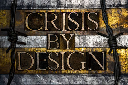 Crisis By Design text on textured grunge copper and vintage gold backgroundの写真素材