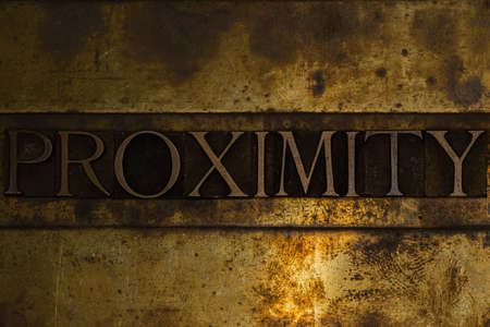 Proximity text message on textured grunge copper and vintage gold backgroundの写真素材