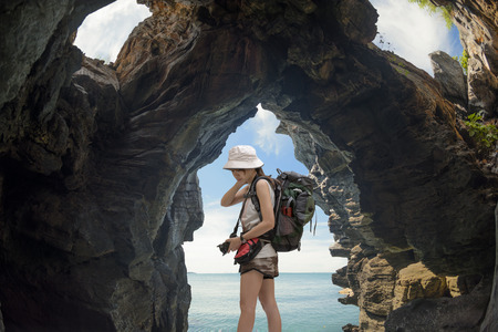 tourist girl lost the way in caveの写真素材