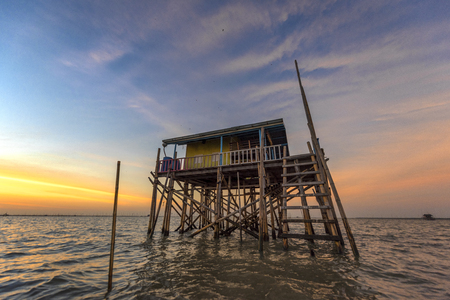 Living Hut at the sea in Sunset sceneryの写真素材