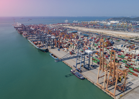 The busy of port congestion loading and discharging  containers services in maritime transports in World wide logisticsの写真素材