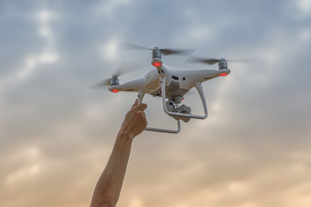 hand releasse/holding drone take off to the sky
